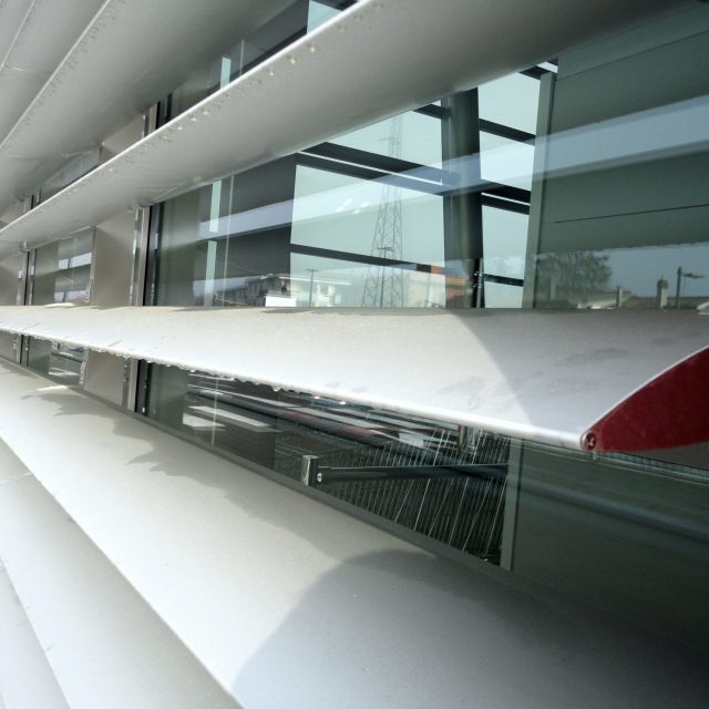 Sunbreakers on an inclined facade